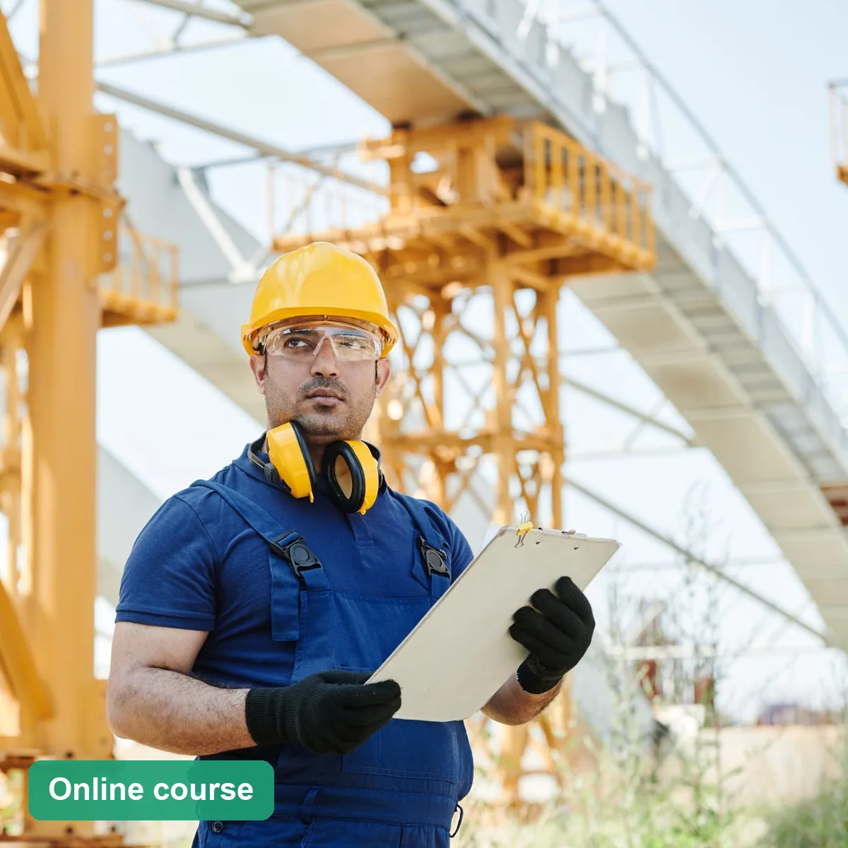 Health and safety representative in a hard hat doing a site inspection with a checklist (online course)